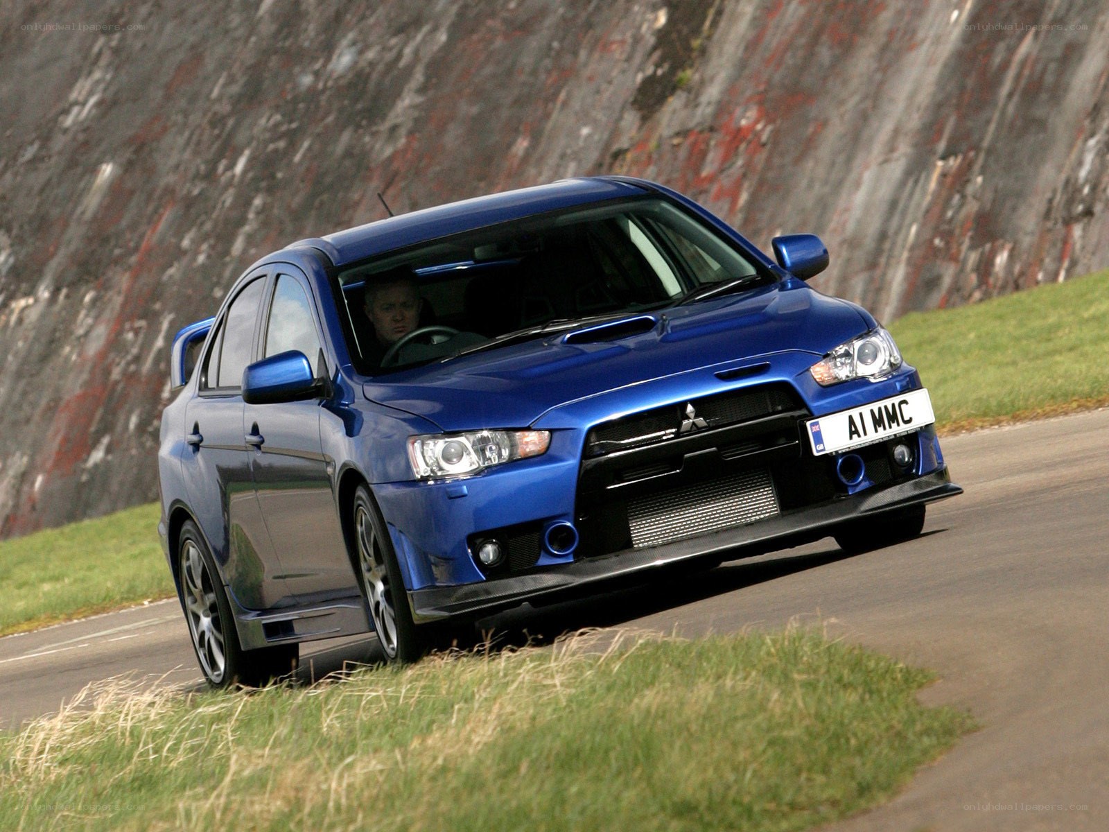 blue mitsubishi lancer evolution