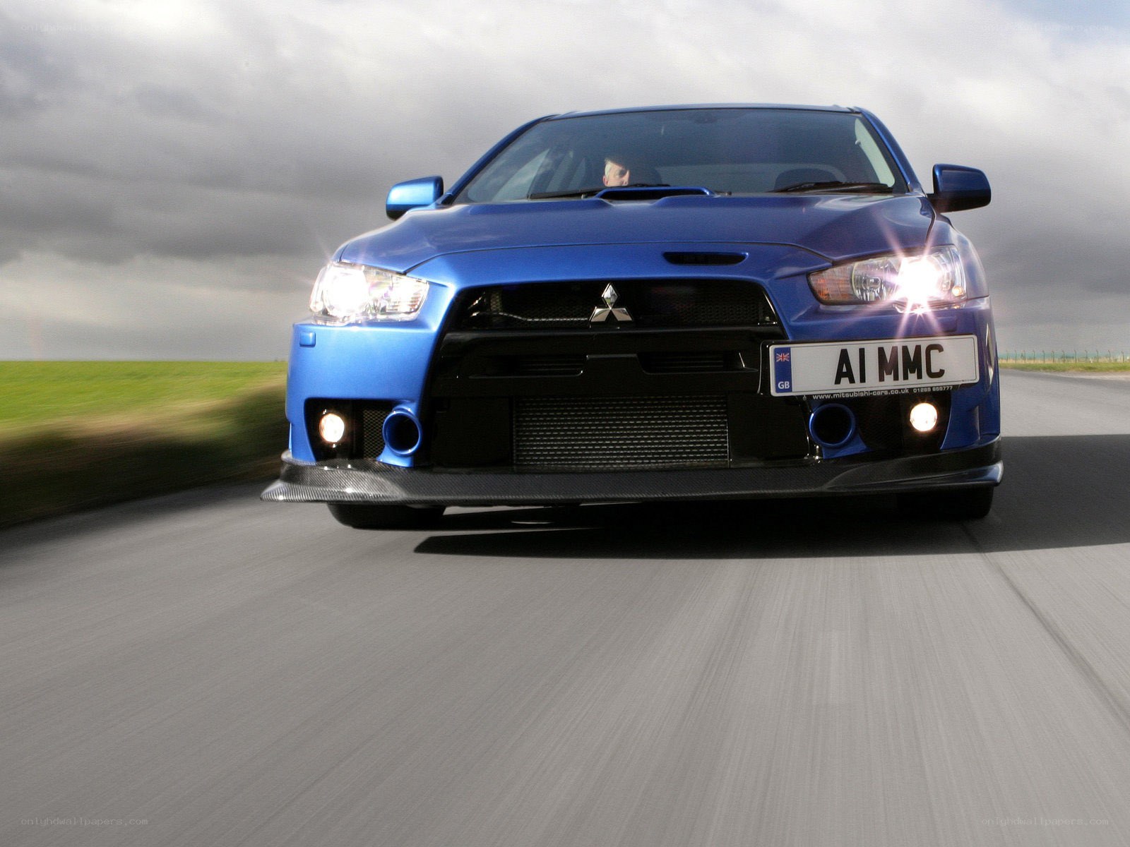 blue mitsubishi lancer evolution