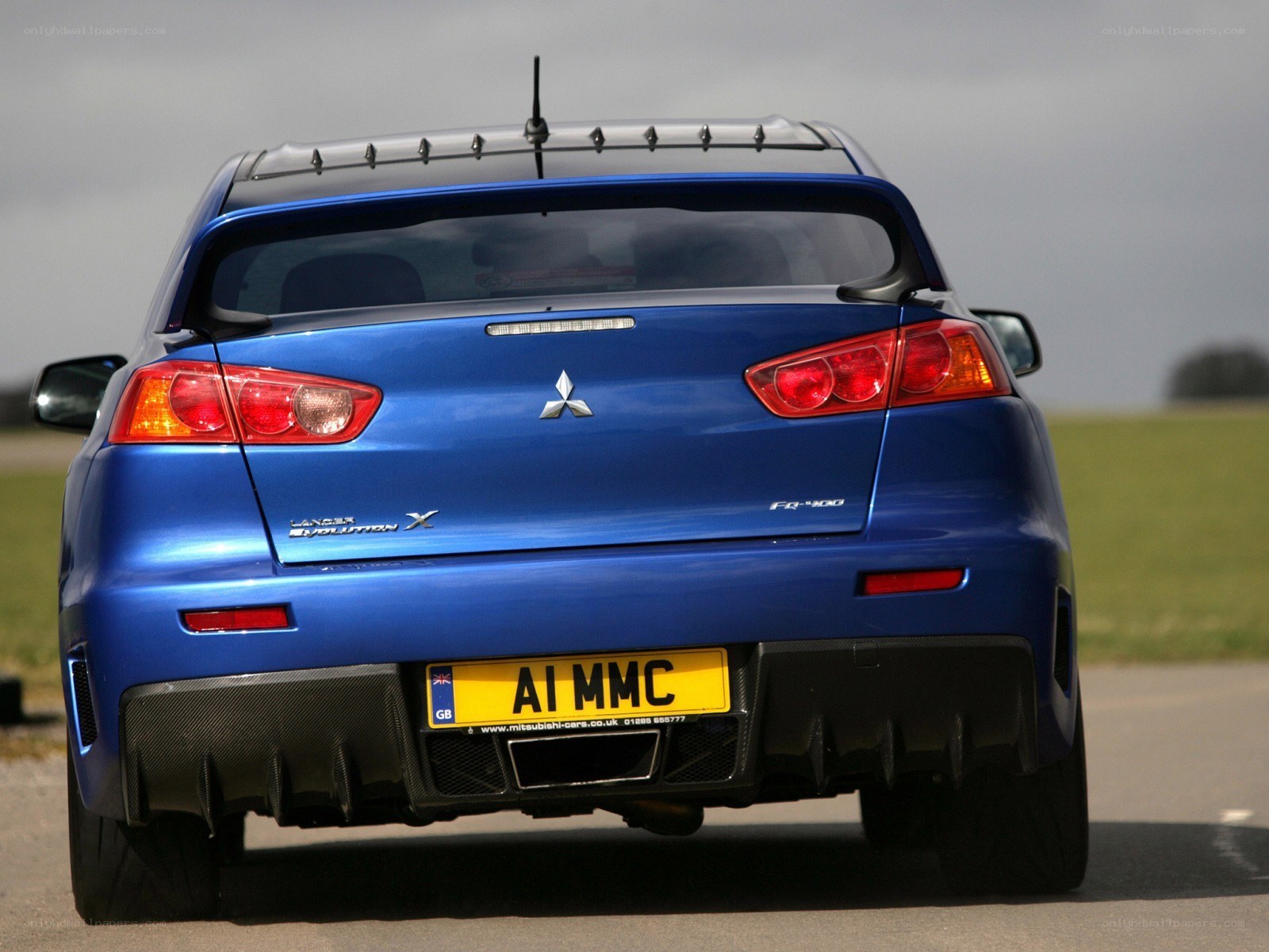 blue mitsubishi lancer evolution x