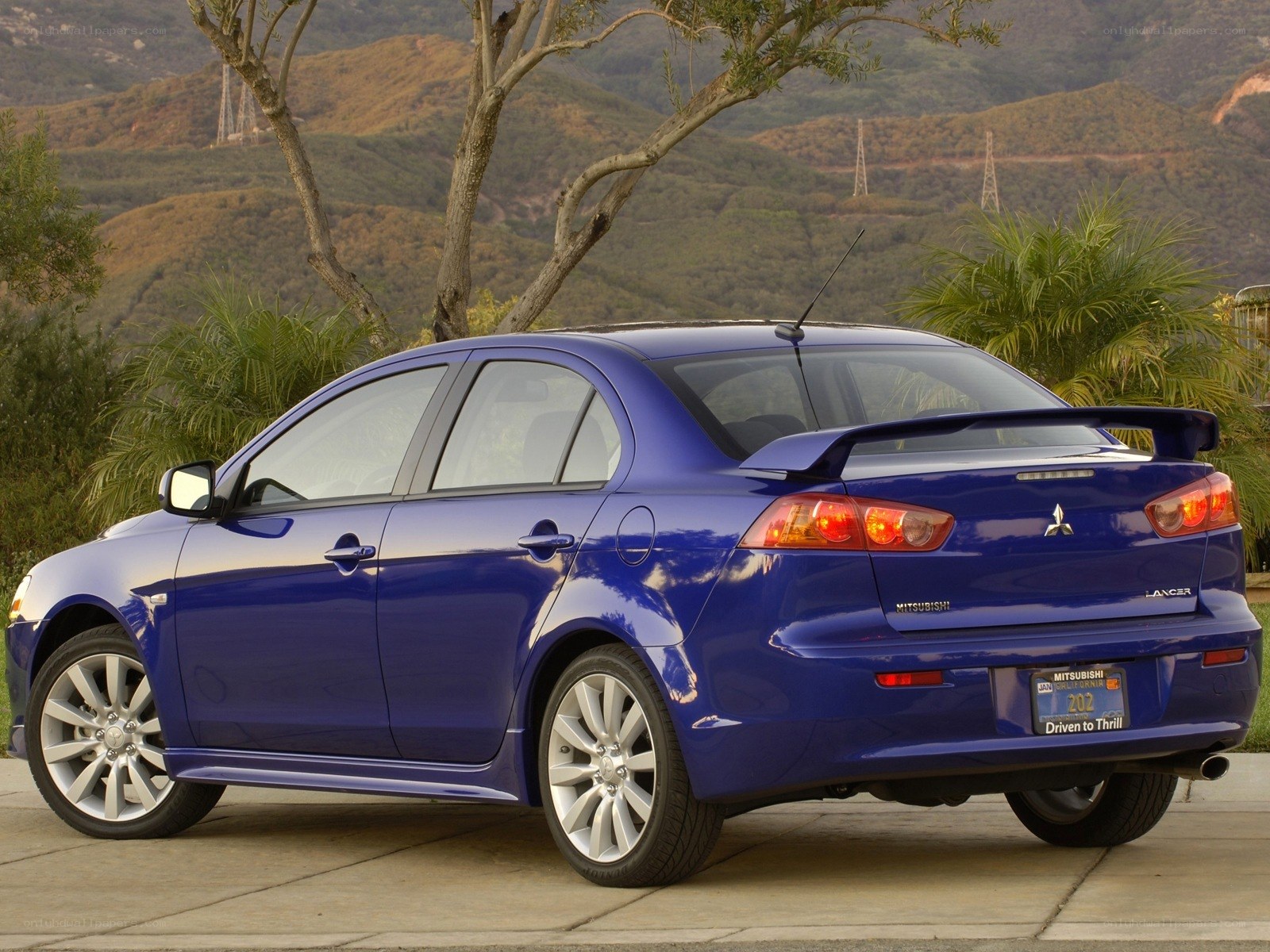 blue mitsubishi lancer sedan
