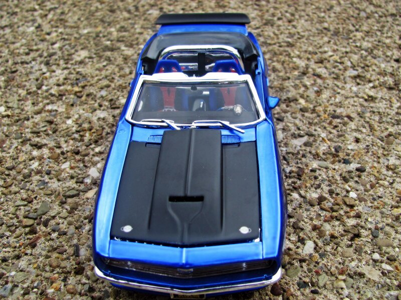Blue Model Car — Neutral, Photograph, Gravel