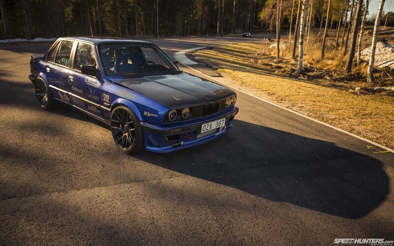 Blue Modified BMW Car — Dramatic, Sunset
