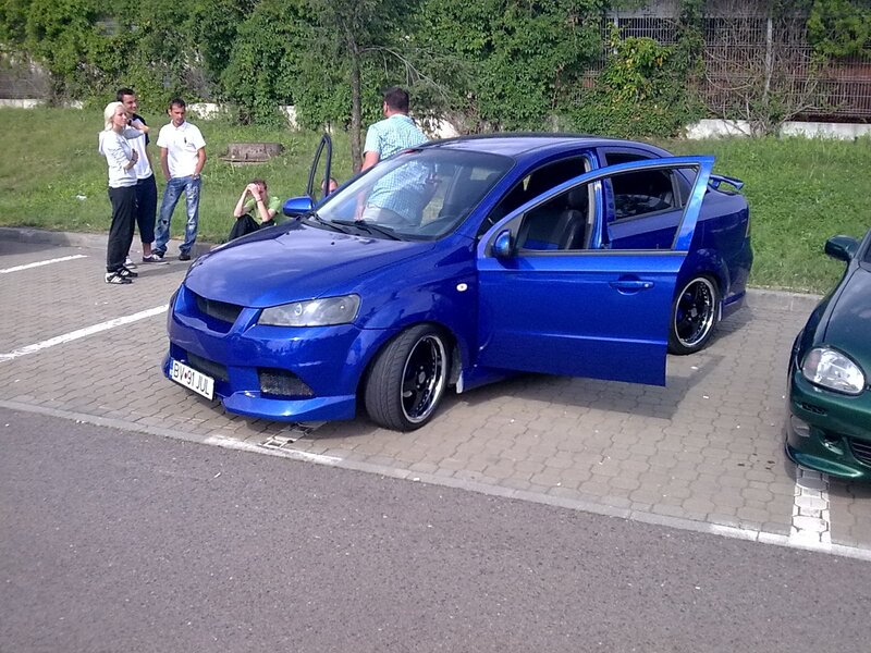 Blue modified car at a meet