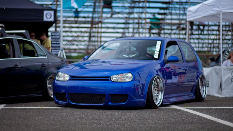 blue modified car at show