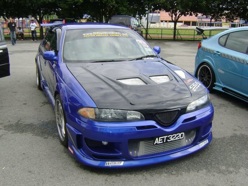 blue modified car at show