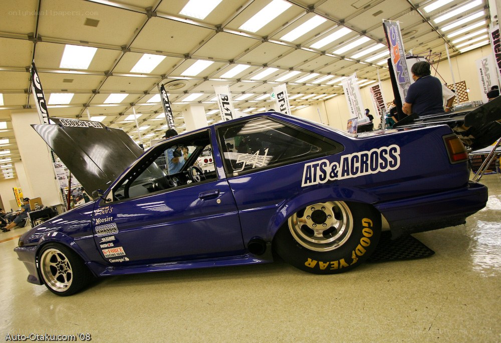 blue modified car at show