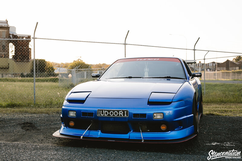 Blue Modified Car — Calm, Sunset, Photograph