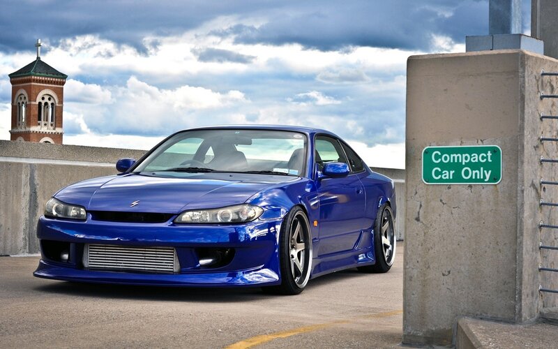 Blue Modified Car — Dramatic, Afternoon, Photograph, Tower, Sign