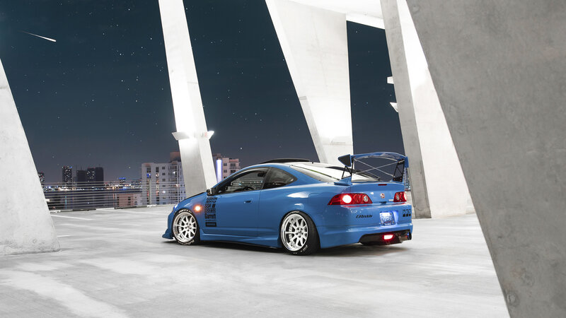 Blue Modified Car — Dramatic, Night, Photograph, City Skyline