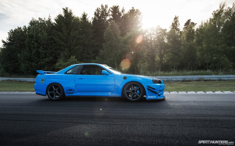 Blue Modified Car — Dramatic, Sunset, Photograph, Race Track