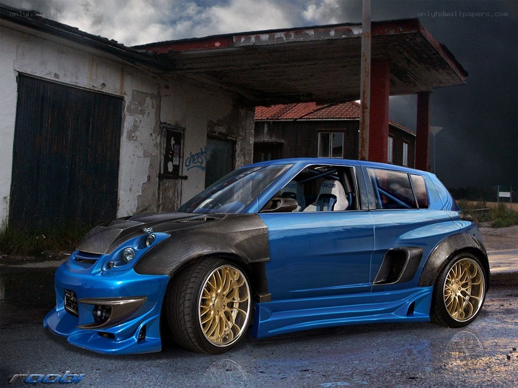 blue modified car in garage