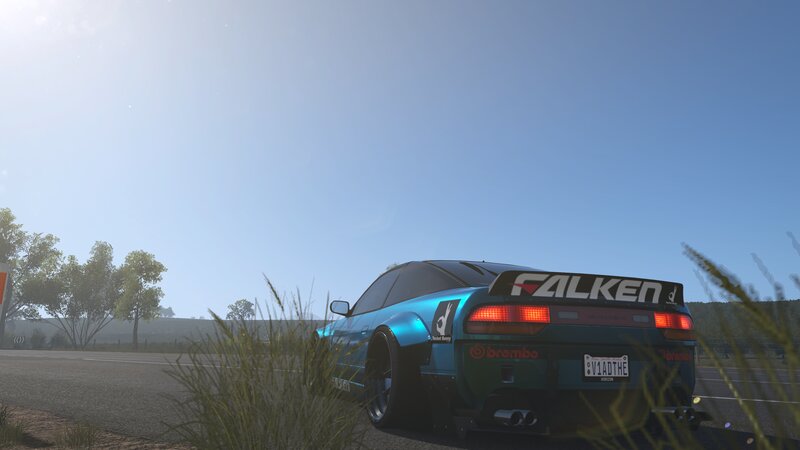 Blue Modified Car — Serene, Afternoon