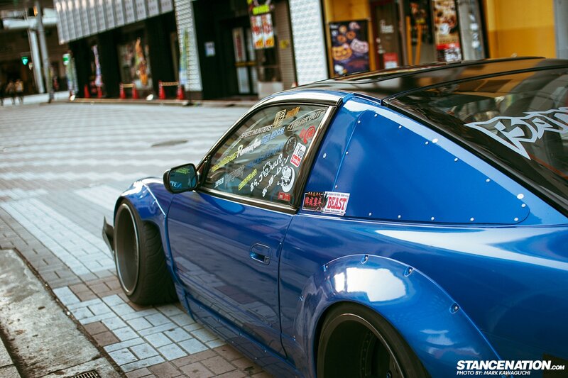 Blue Modified Car — Urban, Afternoon, Photograph, Street, Buildings