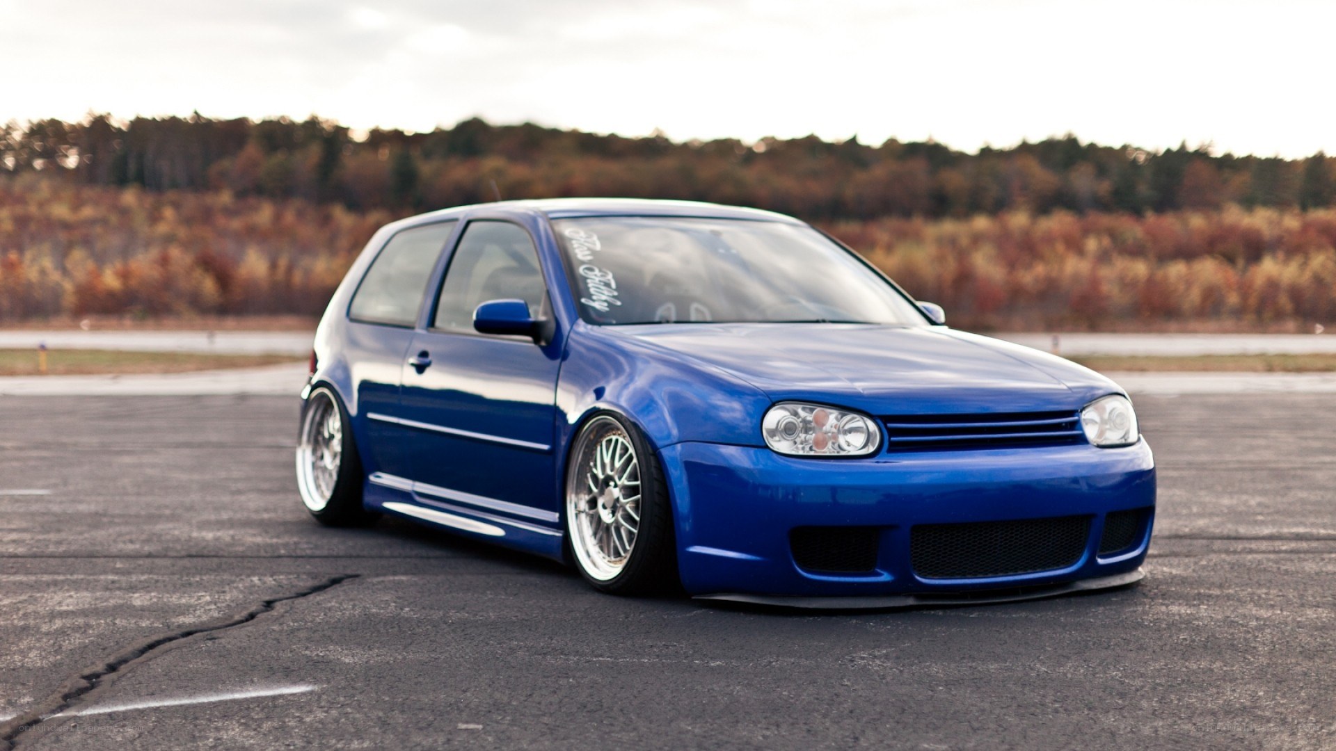 blue modified golf on track