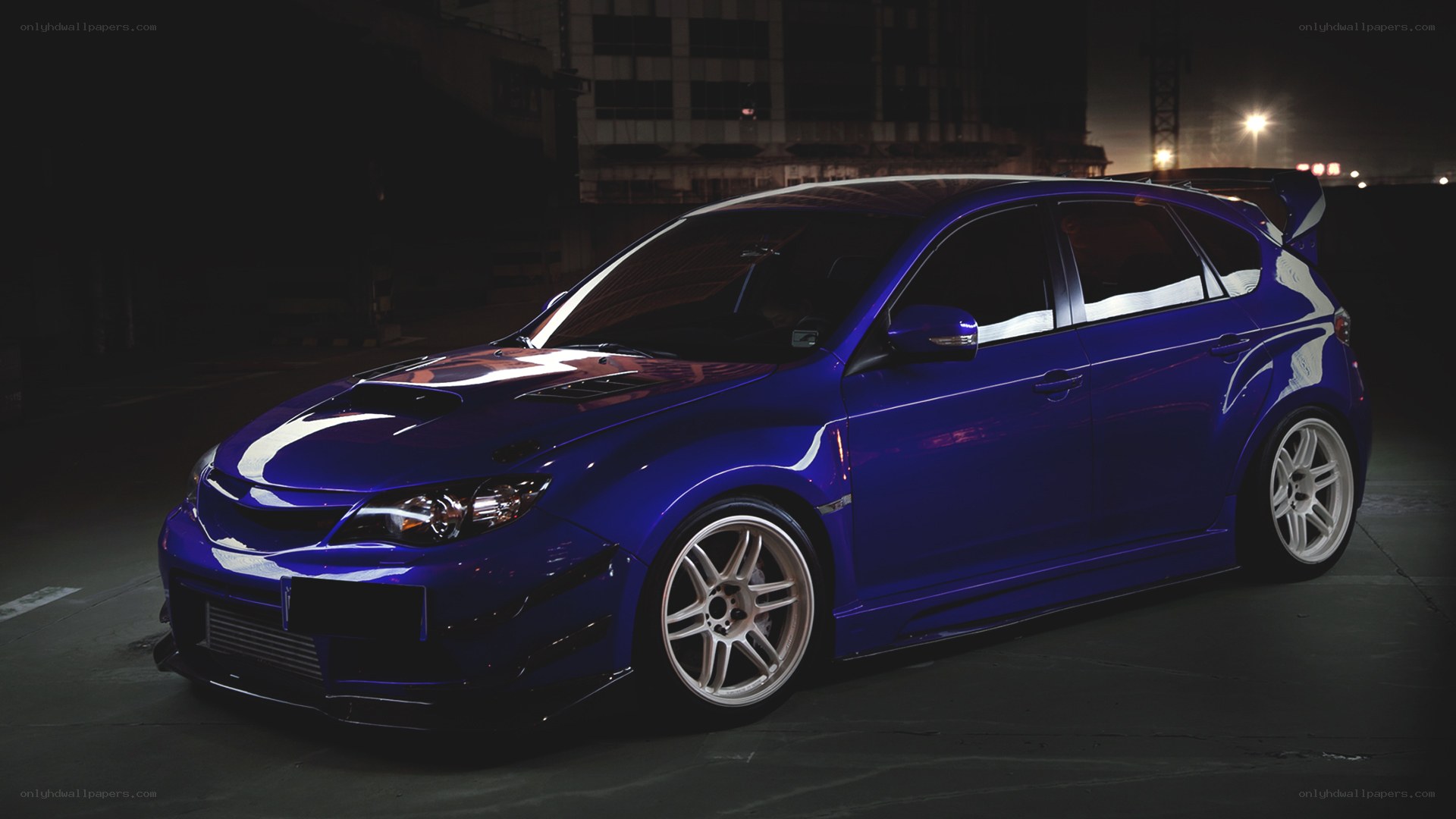 Blue modified hatchback car