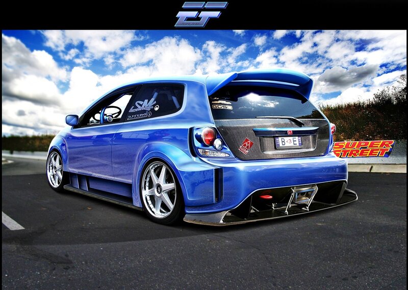 Blue Modified Hatchback — Dramatic, Afternoon