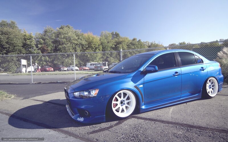 Blue Modified Sedan — Calm, Afternoon, Photograph