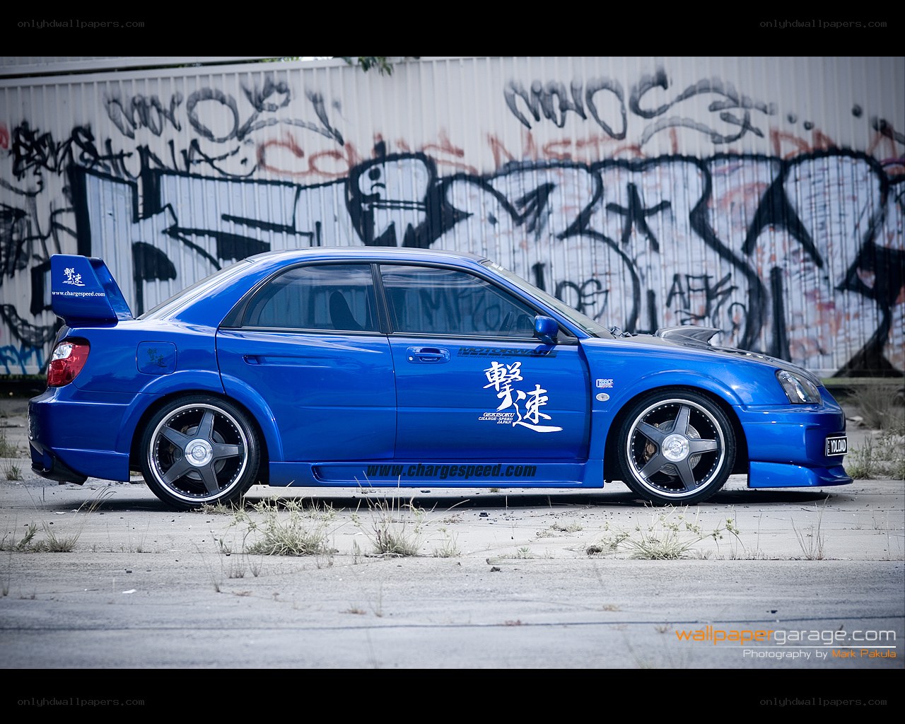 blue modified sedan car