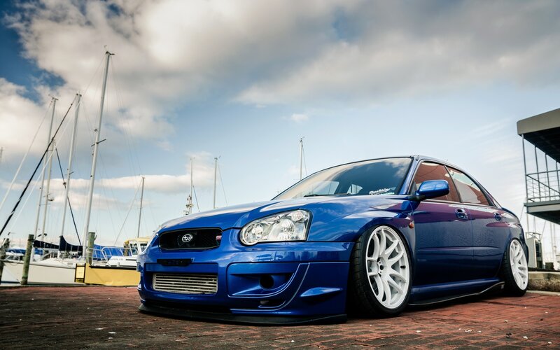 Blue Modified Sedan — Dramatic, Afternoon, Photograph, Sailboats