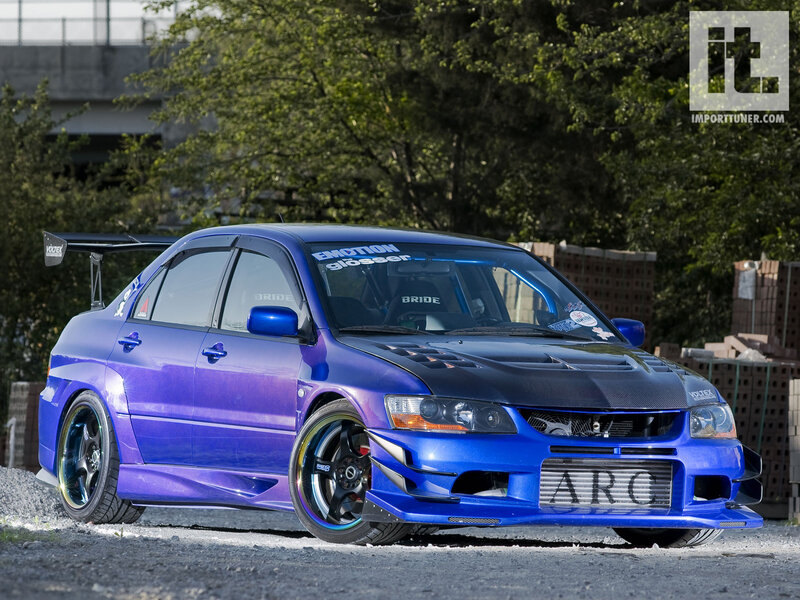 Blue Modified Sedan — Dramatic, Afternoon