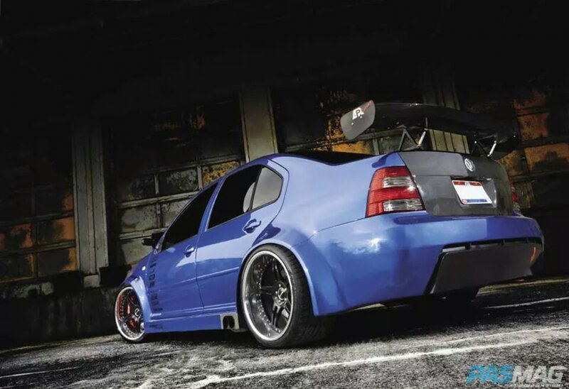 Blue Modified Sedan — Dramatic, Night, Photograph