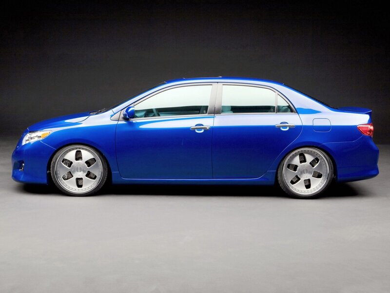 Blue Modified Sedan — Dramatic, Photograph, Car, Wheels, Side Mirror