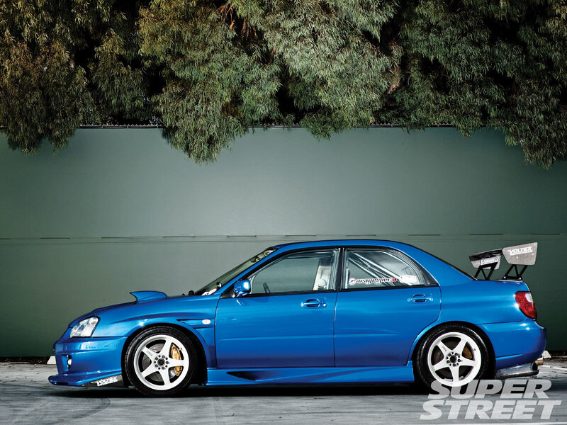 Blue Modified Sedan — Dramatic