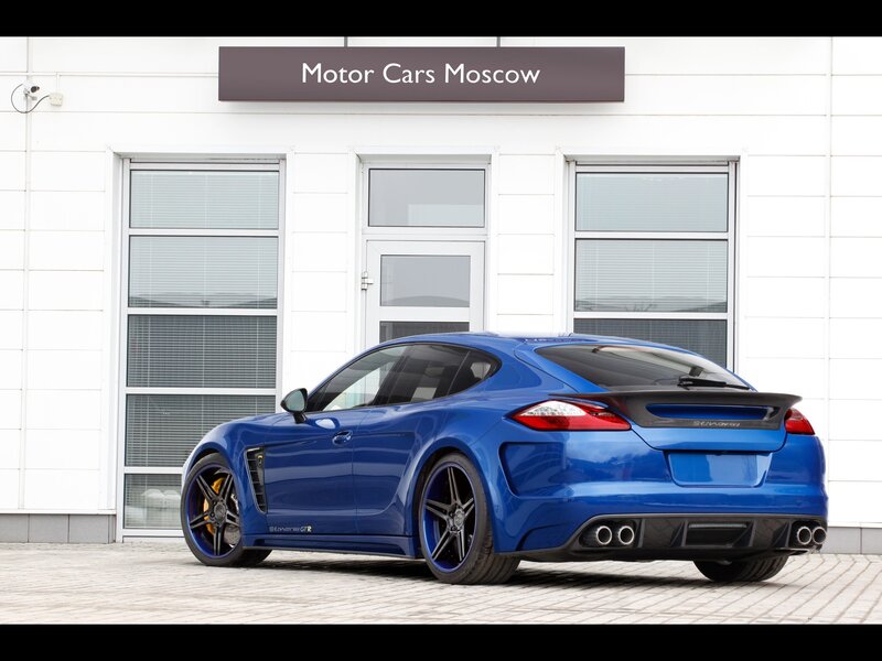 Blue Modified Sedan — Neutral, Afternoon, Photograph, Building