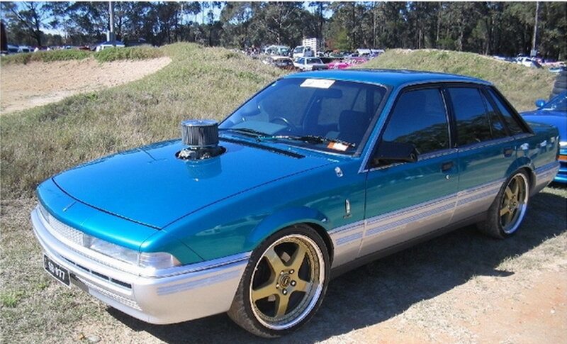 Blue Modified Sedan — Outdoor, Afternoon