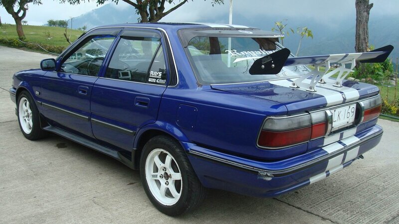 Blue Modified Sedan — Outdoors