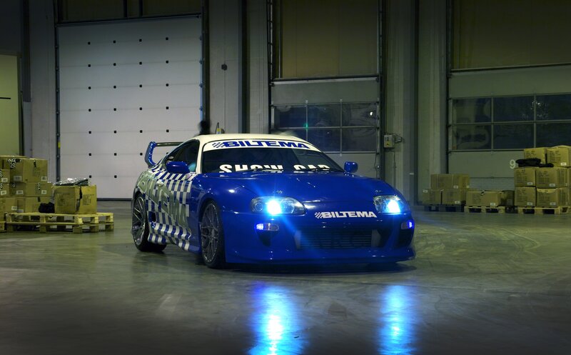 Blue Modified Sports Car — Dramatic, Night, Photograph