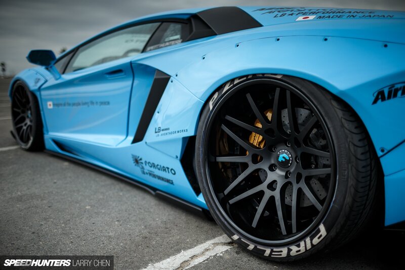 Blue Modified Sports Car — Dramatic, Photograph, Car Wheel