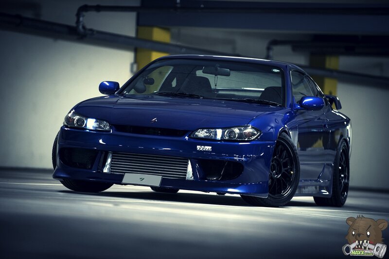Blue Modified Sports Car — Dramatic, Photograph, Parking Garage