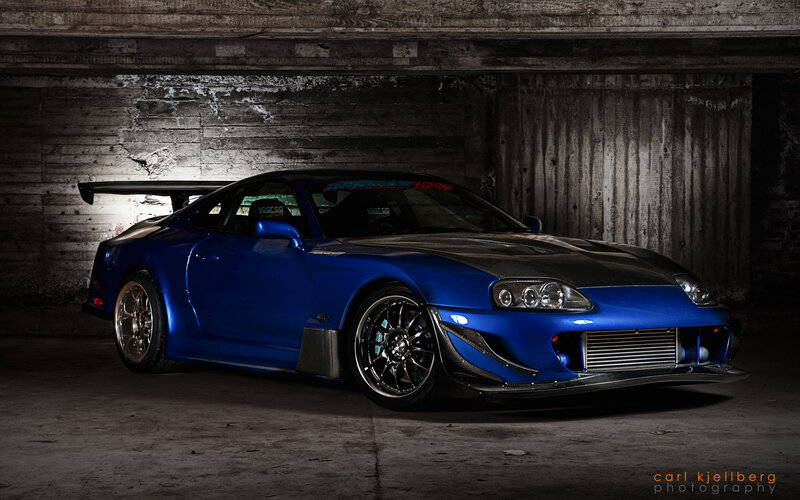 Blue Modified Sports Car — Dramatic, Photograph, Tunnel