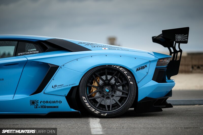 Blue Modified Sports Car — Dramatic, Photograph, Wheel