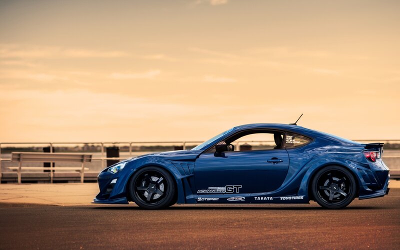 Blue Modified Sports Car — Dramatic, Sunset, Photograph