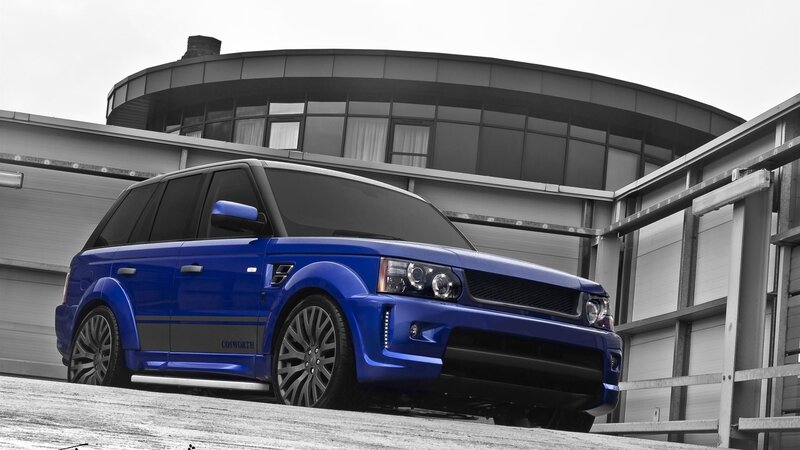 Blue Modified SUV — Dramatic, Photograph, Building