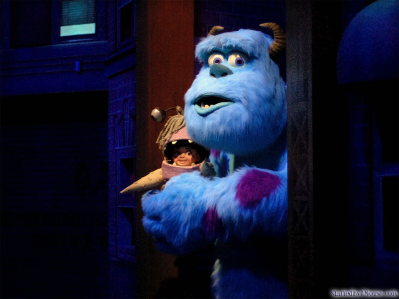Blue Monster Holding Doll