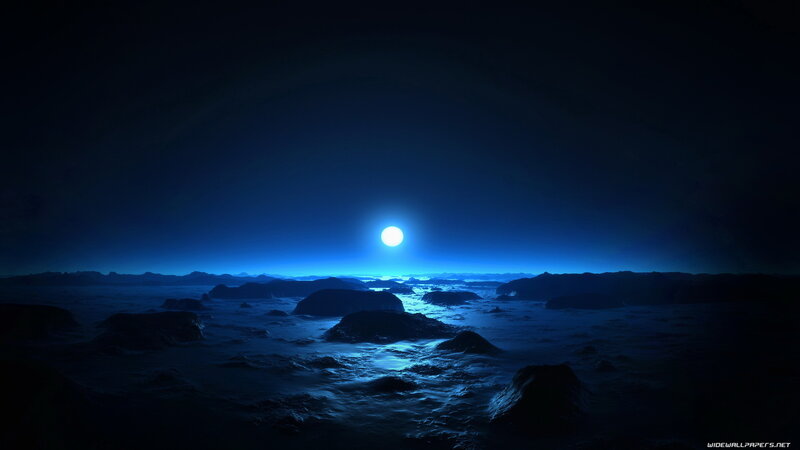 Blue moon over alien landscape