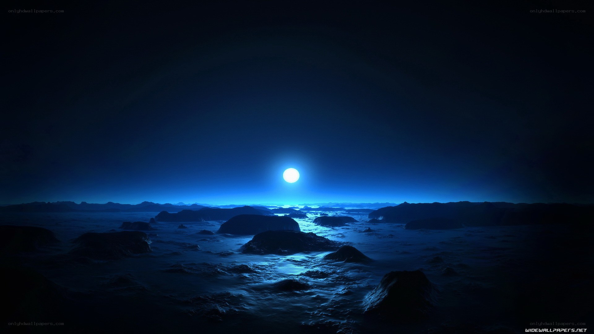 Blue moon over alien landscape