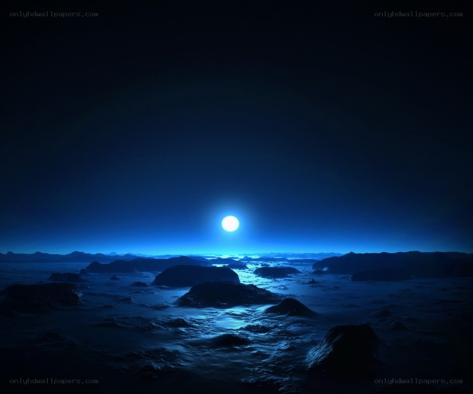 Blue moon over alien landscape