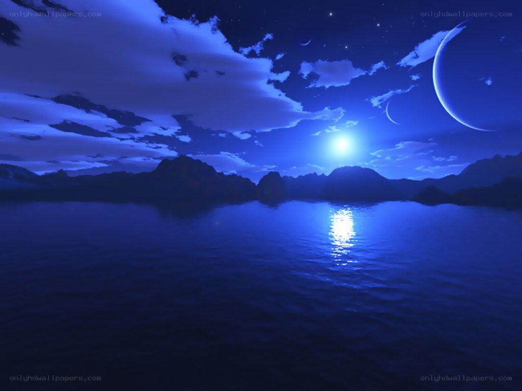 Blue moon over calm waters