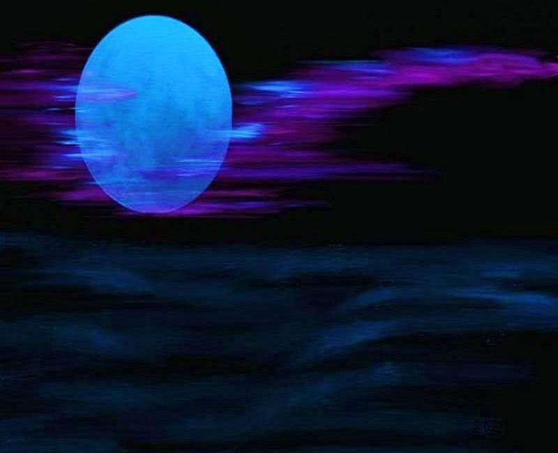 Blue moon over dark sea