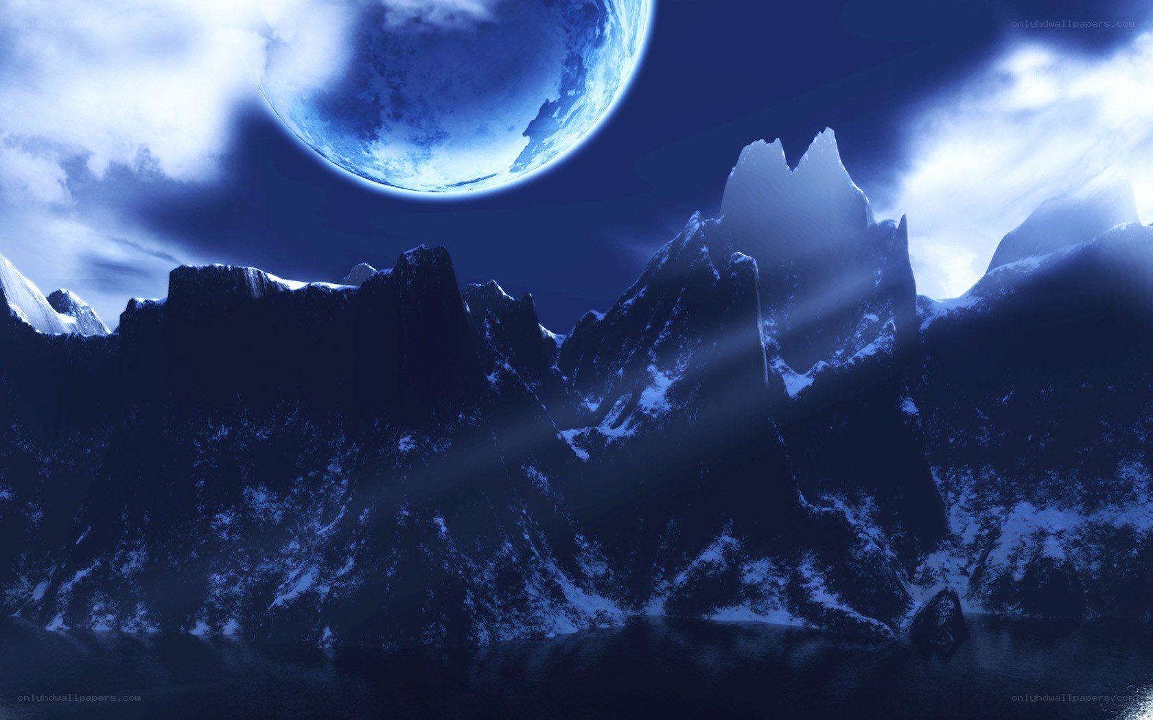 Blue moon over snowy mountains