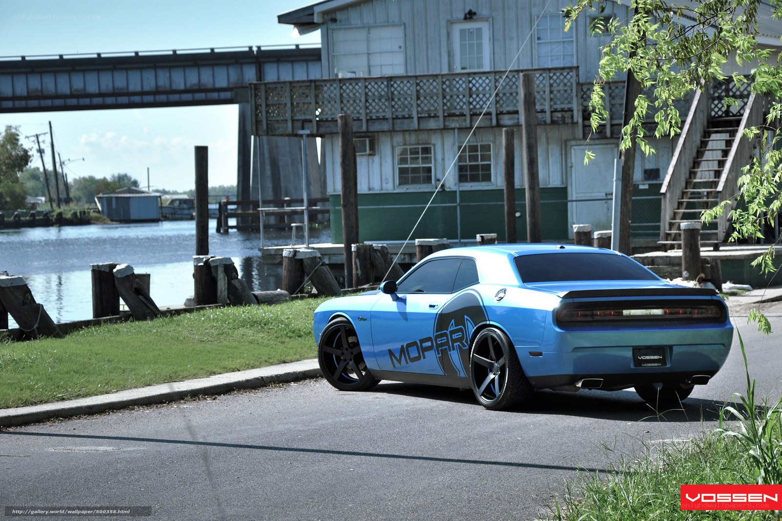 Blue Mopar Challenger by water