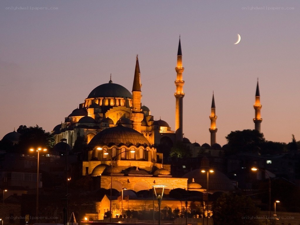 Blue Mosque at dusk with crescent moon
