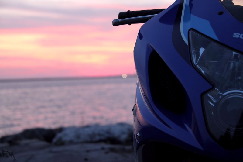 Blue Motorcycle at Sunset