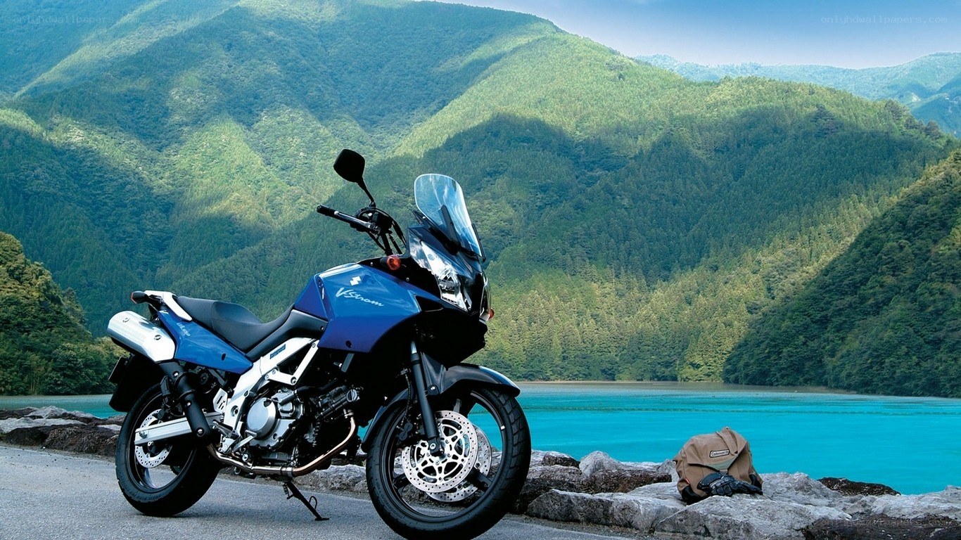 Blue motorcycle by a lake