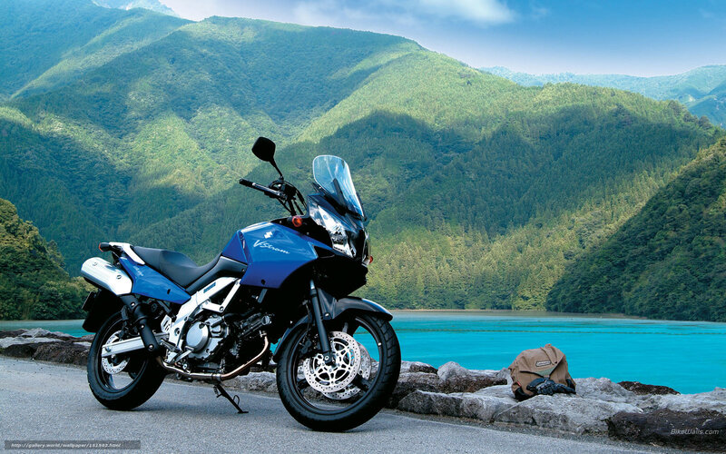 Blue motorcycle by a lake