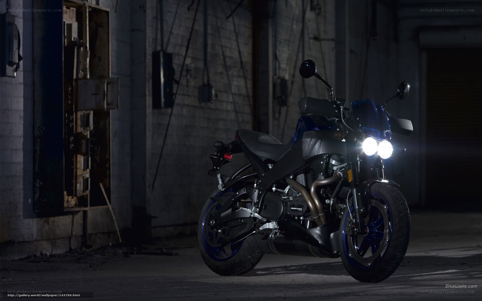 Blue motorcycle in dark alley